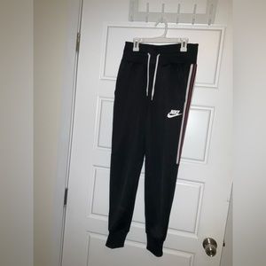 Black striped Nike joggers